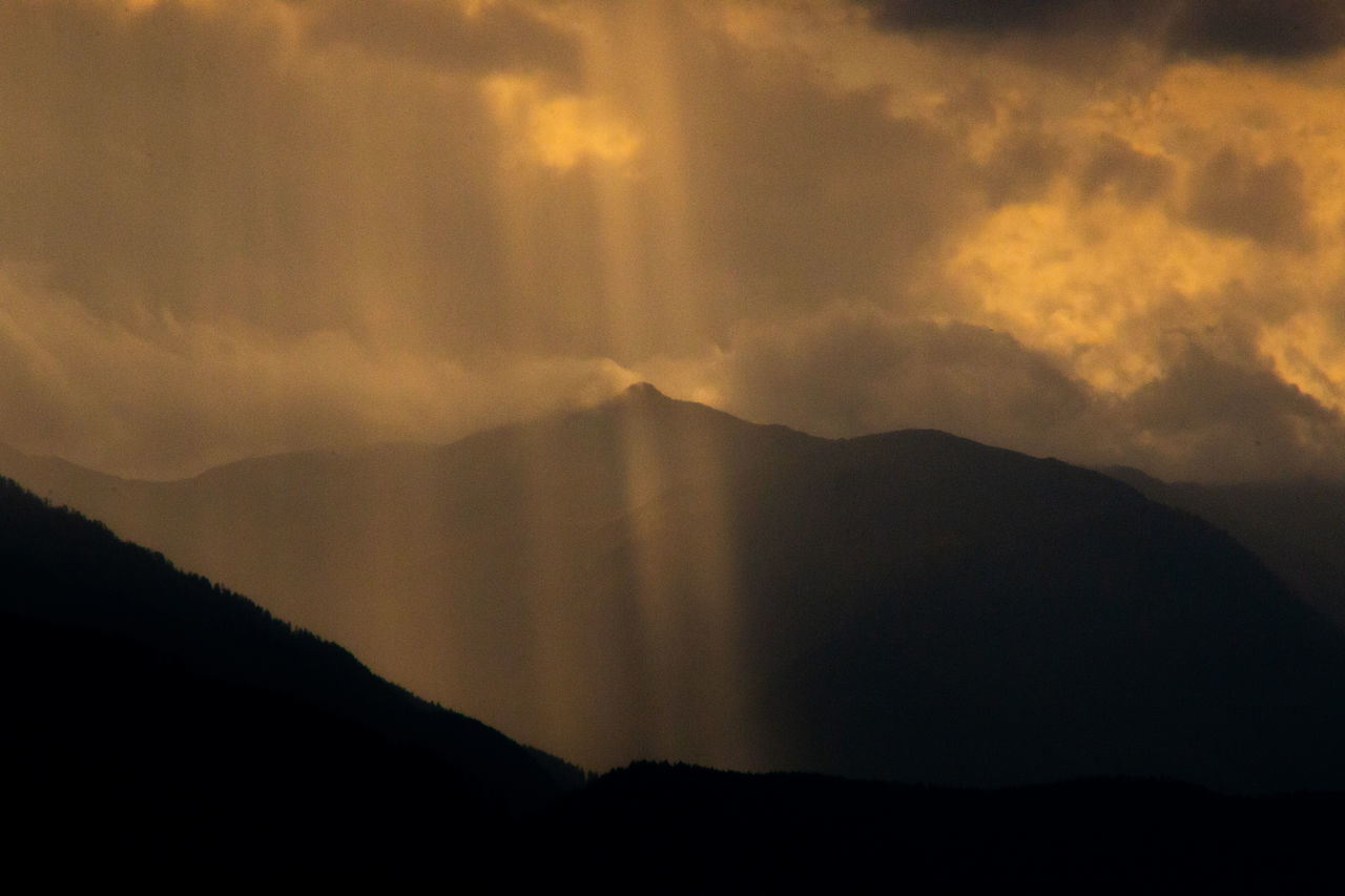 SILHOUETTE MOUNTAIN AGAINST SKY DURING SUNSET