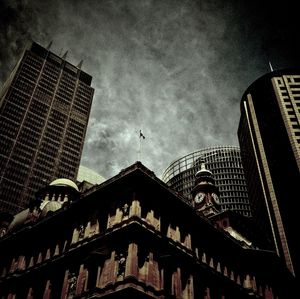 Low angle view of building against sky at dusk