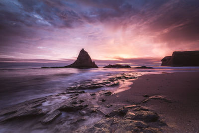 Scenic view of sea against sky during sunset