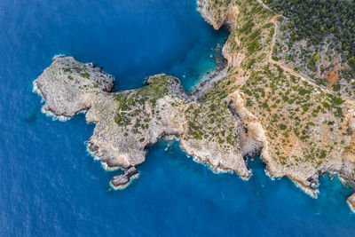 High angle view of rock formation in sea