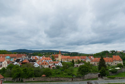 Buildings in city against sky