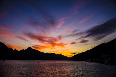 Scenic view of sea against romantic sky at sunset