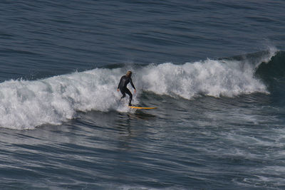 Man surfing in sea