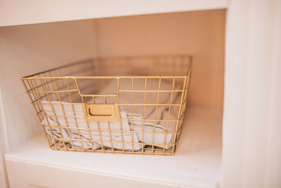 Close-up of wicker basket on table