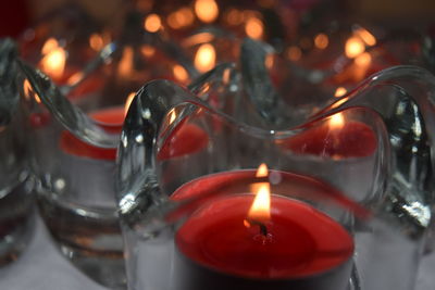 Close-up of illuminated tea light candle