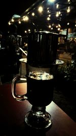 Close-up of coffee served on table at cafe