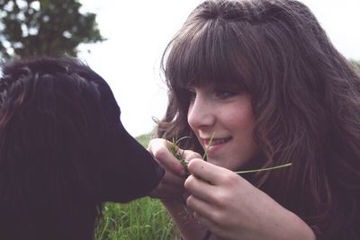 Close-up portrait of woman eating ice cream