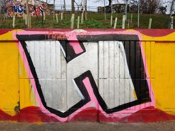 Multi colored tent against wall