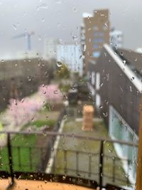 Wet glass window in rainy season