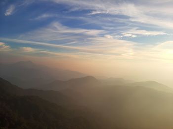 Scenic view of mountains against sky during sunset