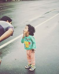 Cute girl playing on street