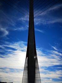 Low angle view of tower bridge against sky