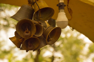 Low angle view of electric lamp hanging