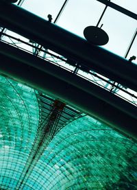 Low angle view of bridge against blue sky