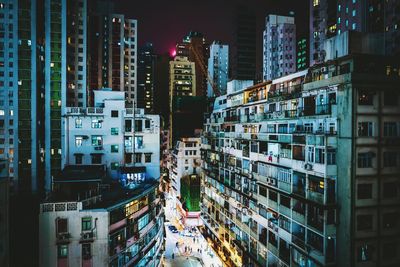 Panoramic view of illuminated buildings in city at night