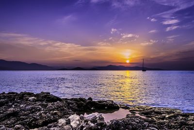 Scenic view of sea against sky during sunset