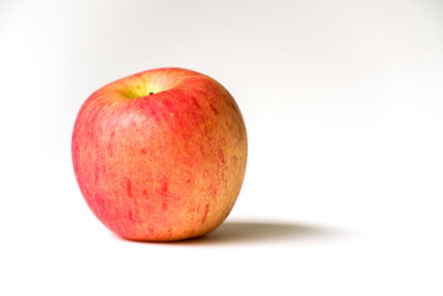 Close-up of apple against white background
