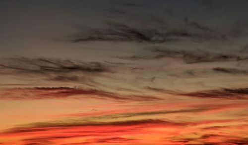 Low angle view of dramatic sky during sunset