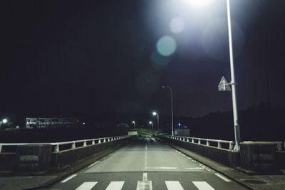 Illuminated street lights at night