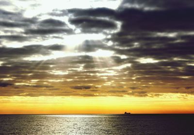 Scenic view of sea at sunset