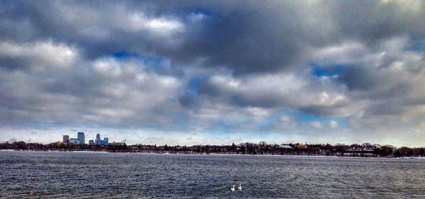 Scenic view of sea against cloudy sky