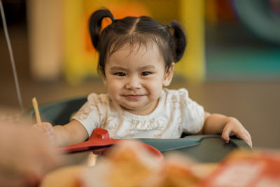 Portrait of cute baby at home