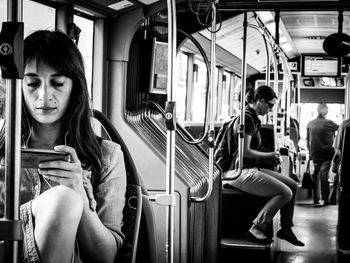Woman sitting in train