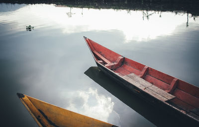 High angle view of fishing boat moored in lake