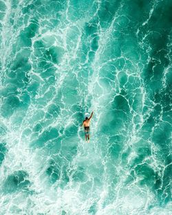 High angle view of person swimming in sea