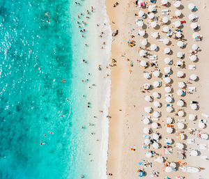 Aerial view of people enjoying at beach