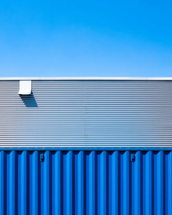 Architectural detail of building against blue sky