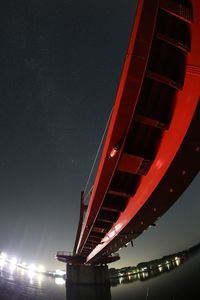 Low angle view of illuminated ferris wheel