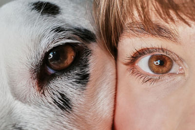 Close-up portrait of woman with dog