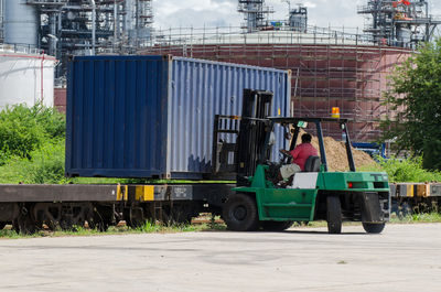 Rear view of man working at construction site