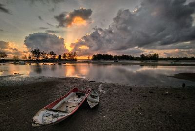 Panoramic view of lake against sky during sunset