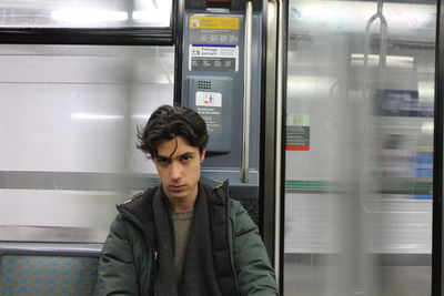 Portrait of man in train