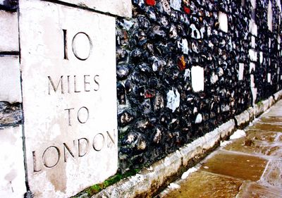 Close-up of text on wall