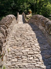 Footpath leading to stone wall