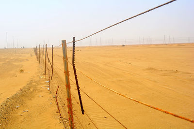 Scenic view of land against clear sky