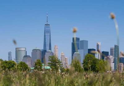 View of modern buildings against clear sky