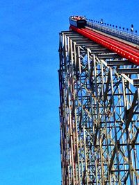 Low angle view of built structure against clear blue sky