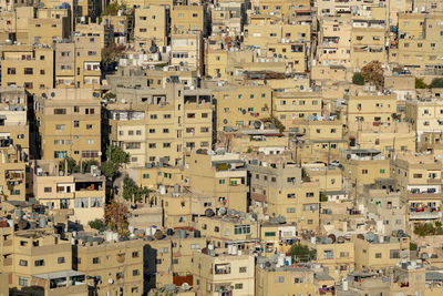 High angle view of residential buildings in city in jordan 