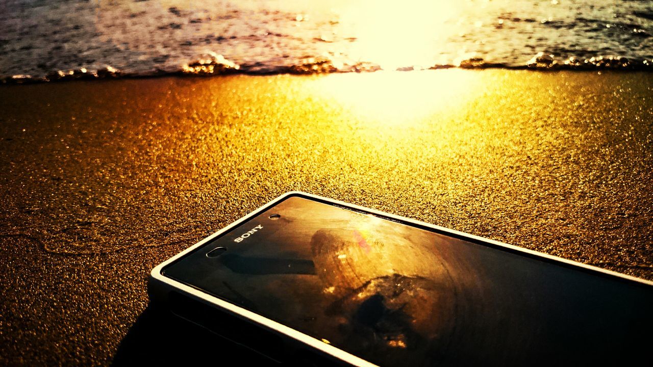 Phone on the sand