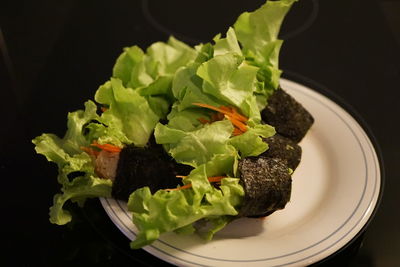 High angle view of chopped vegetables in plate