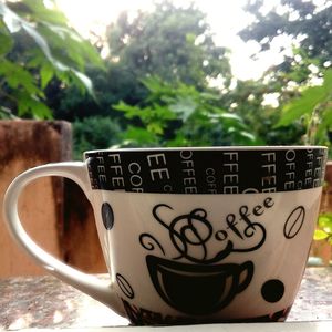 Close-up of coffee cup on table