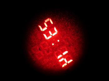 Close-up of information sign on wall