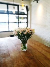 Close-up of flower vase on table