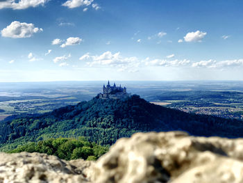 Hohenzollernburg hohenzollern castle scenic view of building on mountain against sky