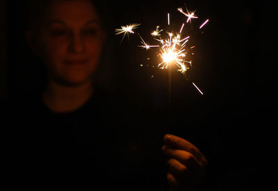 Firework display at night