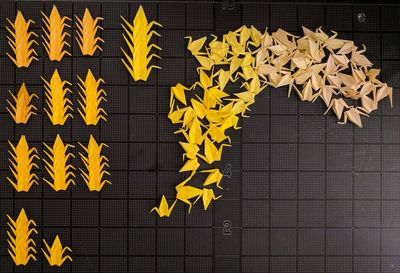 High angle view of yellow leaves on floor